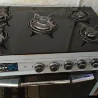 اجاق گاز طرف فر سالم و مرتب