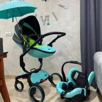 کالسکه و کریر بسیار زیبای برند doux bebe - تاشو