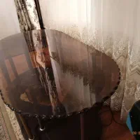 فروش یک میز جلومبلی شیشه ای با سه تا عسلی شیشه ای
