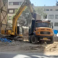 بیل مکانیکی ،خاکبرداری،تخریب ساختمان