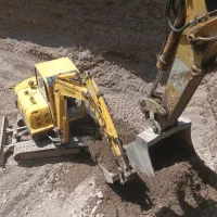 اجاره مینی بیل بابکت تخریب و خاکبرداری