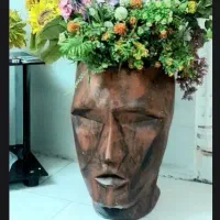 گلدان چهره و گل وبوته مصنوعی