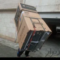 کارگر  ورزیده و با تجربه حمل یخچال سایدومبل  وسایل