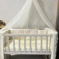 تخت گهواره ایی کنار تخت مادر