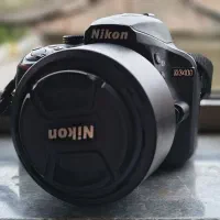 دوربین نیکون D3400 با لنز 50 f1.8 و لوازم