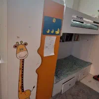 تخت دو طبقه کودک و کمد