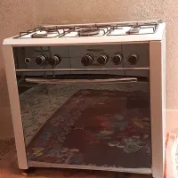 گاز پنج شعله طرح فر و میز تلویزیون