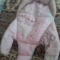 اغوشی نوزاد و بالشت طبی گردن