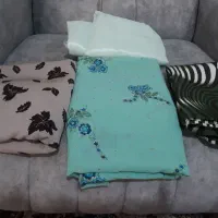 چندتیکه پارچه نو همه باهم ۱۲۰۰