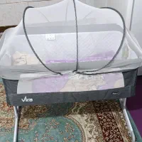 گهواره وتخت کنارمادر دلیجان ویرا