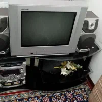 تلویزیون ۲۱ اینچ ال جی با میز شیشه ای نشکن