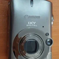 دوربین عکاسی مارک Canon ژاپنی با سه پایه عکاسی