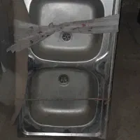 یک سینک دوقلو استیل نو .مصرف نشده