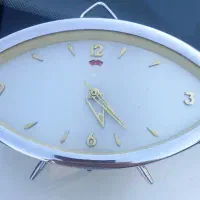 ساعت‌ کوکی‌ قدیمی‌ زنک‌ خور