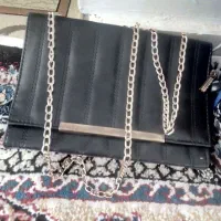 کیف|کیف، کفش، کمربند|نهاوند, |دیوار