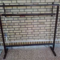 دارقالی. دفتین قیچی. مقداری نخ وابریشم درجه یک.