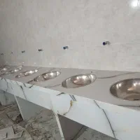 اجرای‌کاشی‌وسرامیک‌به‌صورت‌چسبی‌ودوغابی‌