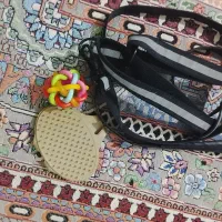قلاده،توپ و شانه