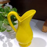 تنگ سفالی و وسایل آشپزخانه