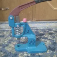 دستگاه پرس دکمه
