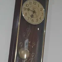 ساعت دیواری طرح چوب