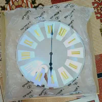 ساعت دیواری آینه‌ای