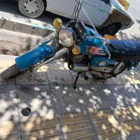 موتور یاماها  و یک جفت خطر و چراغ ۲۰۶