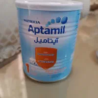 تعدادی قوطی خالی با درب و قاشق