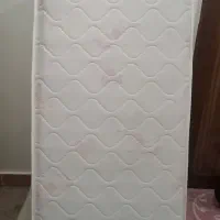 تشک خوشخواب بچگانه به همراه پرده اتاق
