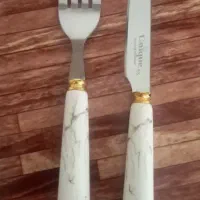 چنگال وچاقومیوه خوری