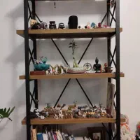 کتابخانه قفسه استند گل استند فلزی (فروشگاه قبادی)