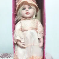 عروسک موزیکال آکبند