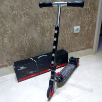 اسکوتر فلزی چراغدار و ترمز دار