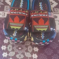 یک جفت دمپایی دست بافت