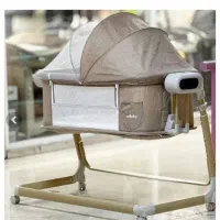 تخت خواب کنارمادروگهواره برقیcool baby