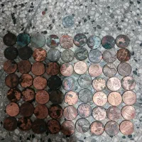 63عدد سکه یک سنتی آمریکایی و یک عدد کانادایی.