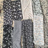 ۸ طرح پارچه چادری گلدار و دو طرح پارچه مشکی