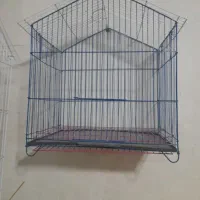 تعدادی قفس پرنده در سایز مختلف