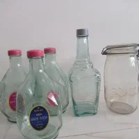 تعدادی شیشه آبغوره و ابلیمو