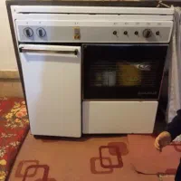 گاز فر دار قدیمی سالم چهار شعله با دو دم کن