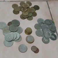 سکه ایرانی و تخته کلکسیونی