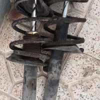 کمک 206 همراه با فنر در حد نو