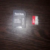 رم میکرو  micro SD sandisk 64GB class10