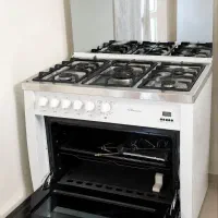 اجاق گاز نو ۵ شعله دارای فر زمان سنج دیجیتالی سفید