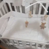 گهواره و تخت کنار مادر نو نو