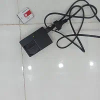 شارژر باتری دوربین سونی مدلBG1به همراه باتری