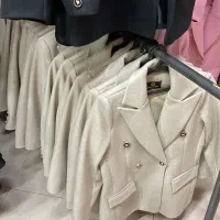 سرنخ زن خانم و دکمه دوز خانم