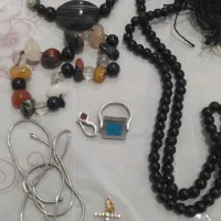 چند عدد تسبی سنگ چشم ببری و و همش باهم  ۵۰۰ هزار