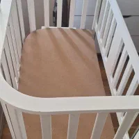 تخت نوزادی کنار مادر