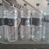 بطری آب معدنی و جا نوشابه